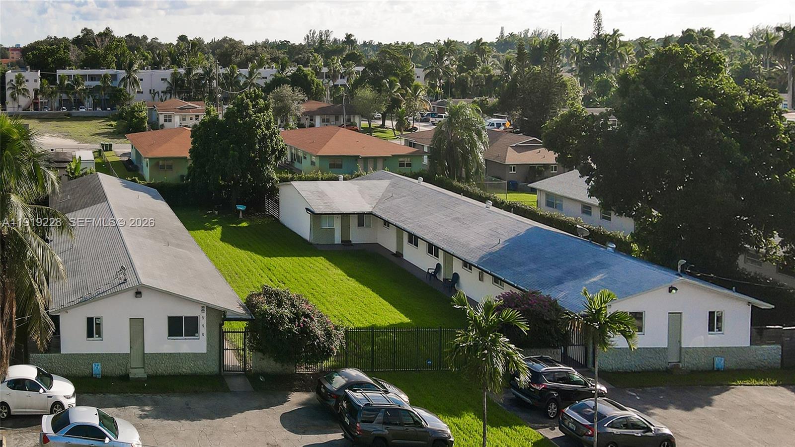 592 Northeast 150th Street, Unit 3 Miami, FL 33161 - Photo 2 of 22 a view of a patio in backyard