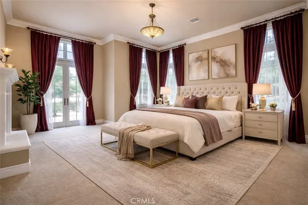 a bedroom with a bed couch and a window