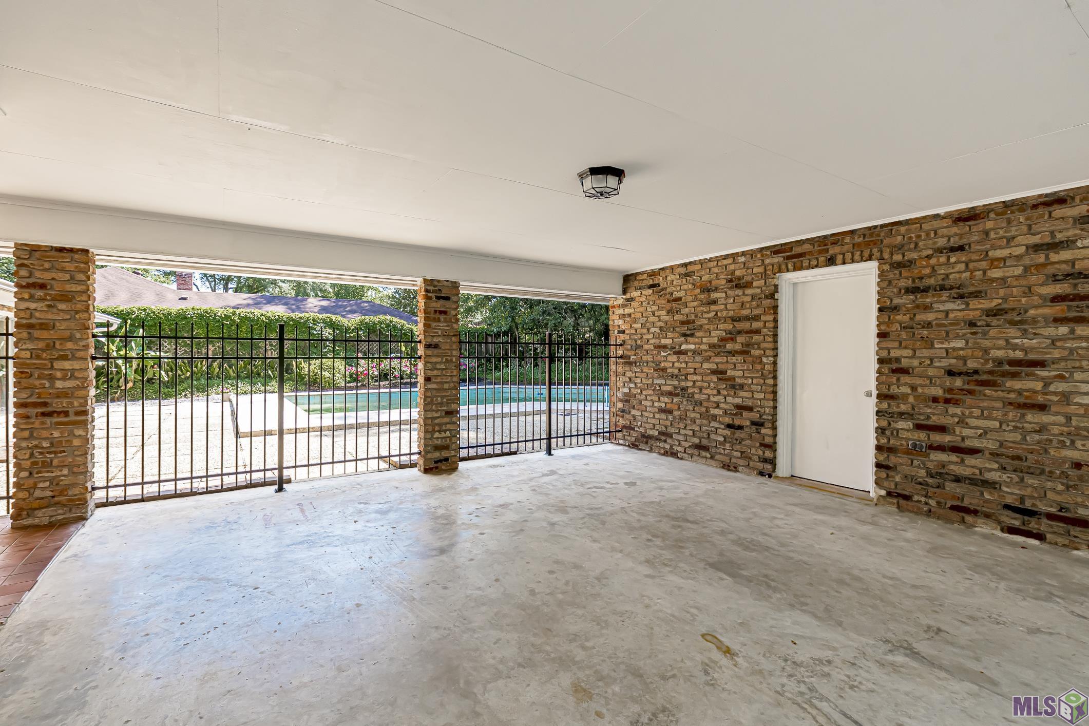 630 Rue Crozat Baton Rouge, LA 70810 - Photo 31 of 46 Carport - Storage - Pool