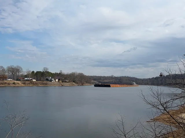 an aerial view of city and lake