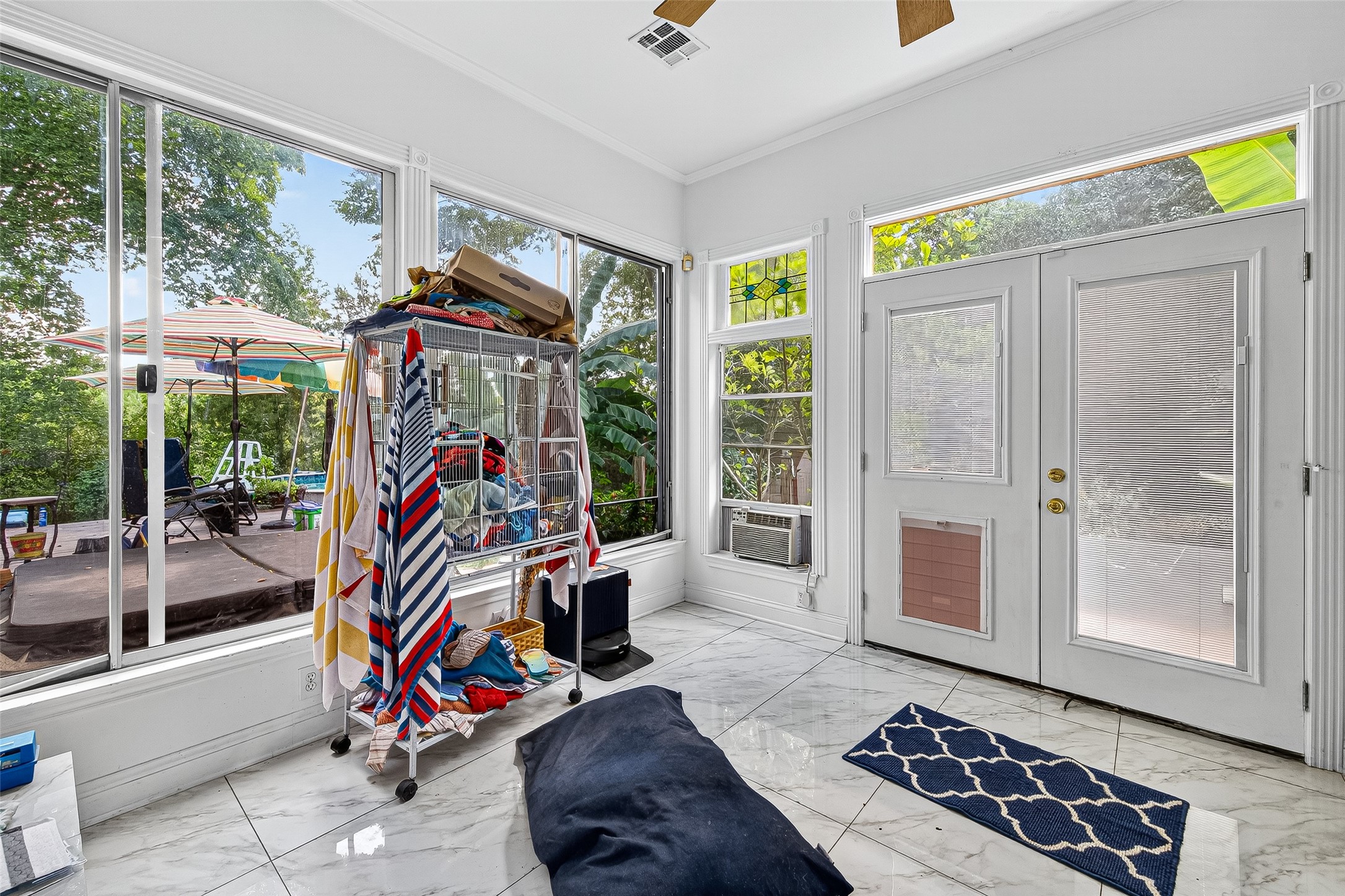 10116 Brighton Lane Houston, TX 77031 - Photo 30 of 50 a view of a room with gym equipment and windows