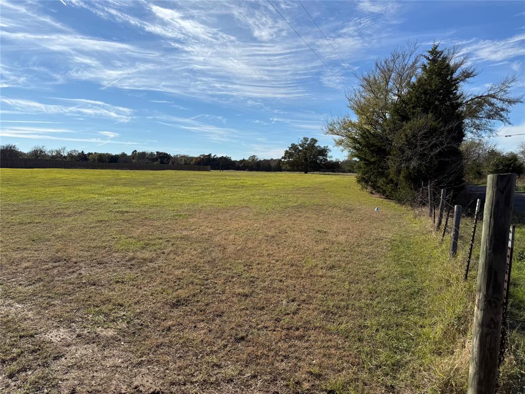 a view of an ocean from a yard