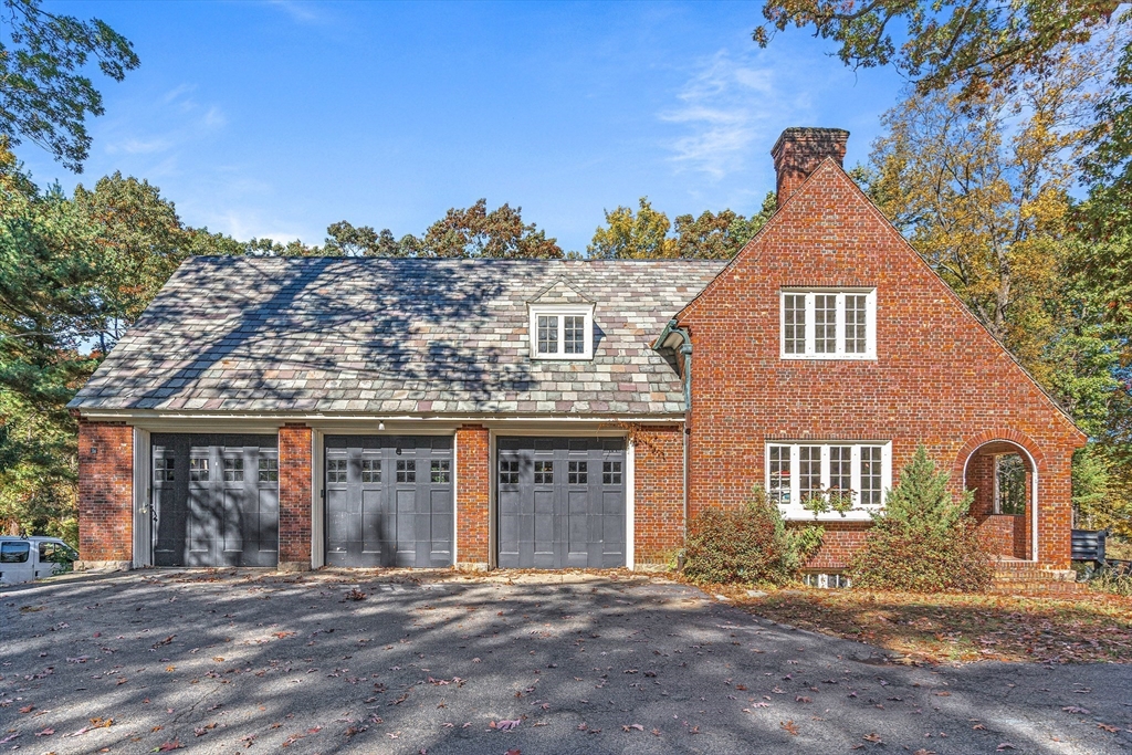 33 Bullard Road Weston, MA 02493 - Photo 2 of 12 a front view of a house