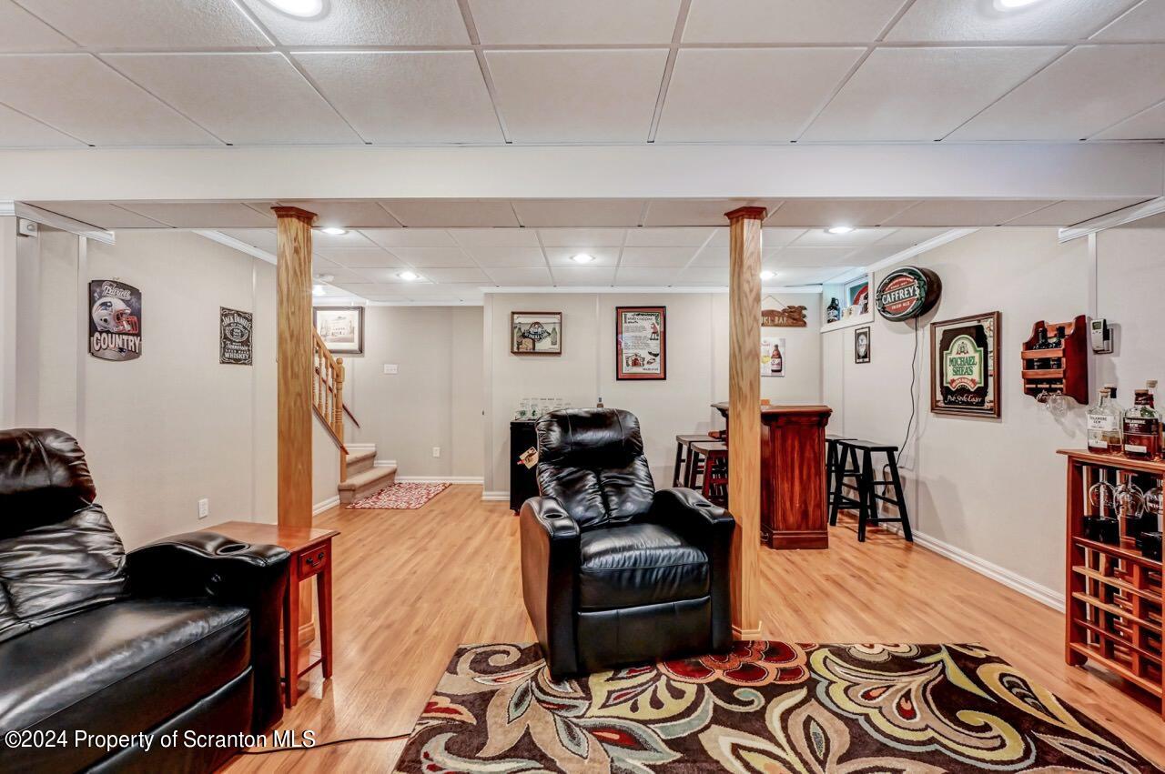 755 Spring Hill Road Sterling, PA 18463 - Photo 53 of 99 a living room with furniture and wooden floor