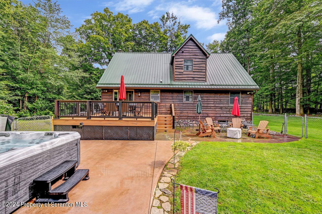 755 Spring Hill Road Sterling, PA 18463 - Photo 62 of 99 a view of a house with swimming pool and sitting area
