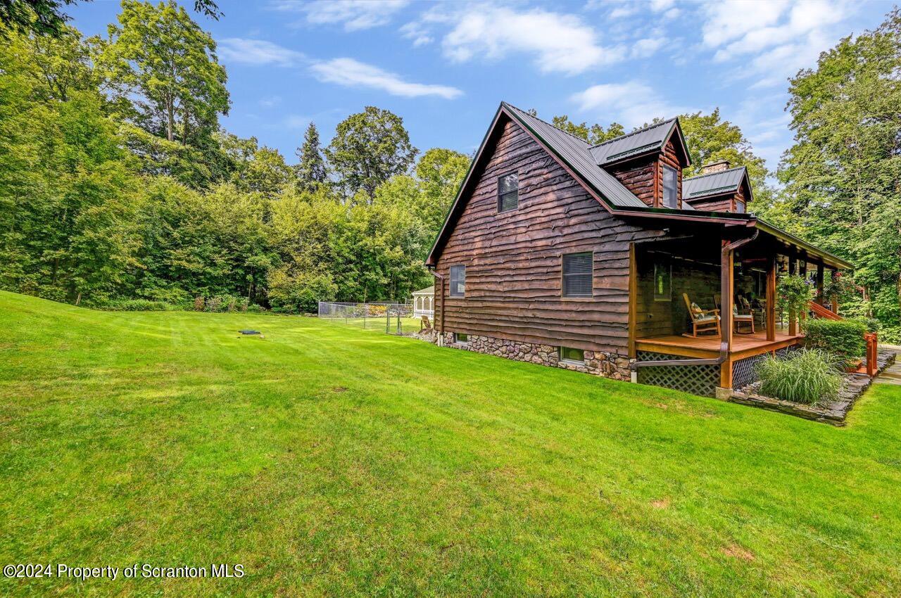 755 Spring Hill Road Sterling, PA 18463 - Photo 81 of 99 a view of a house with a backyard