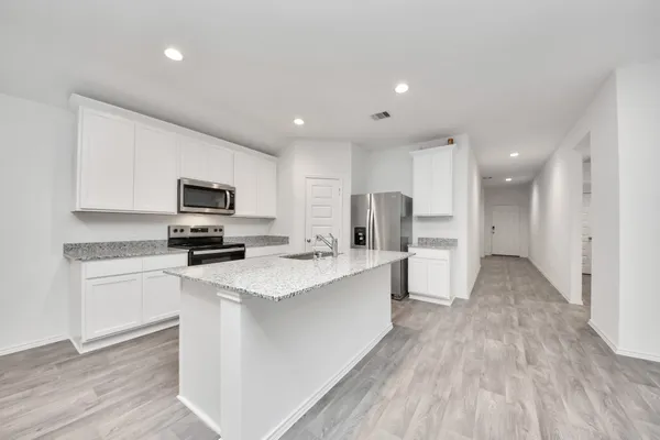 an empty room with an entryway