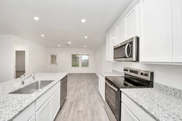 a view of backyard with trampoline