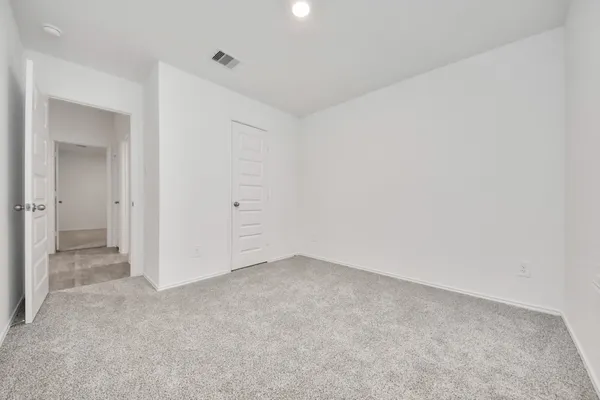 a kitchen with stainless steel appliances a refrigerator stove microwave and cabinets