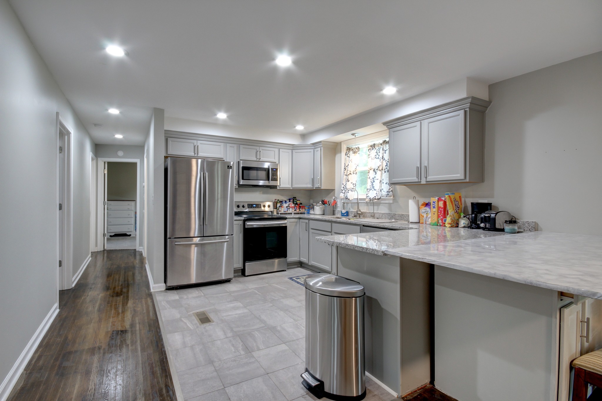 309 Burch Road Clarksville, TN 37042 - Photo 1 of 12 a kitchen with stainless steel appliances granite countertop a refrigerator sink and stove