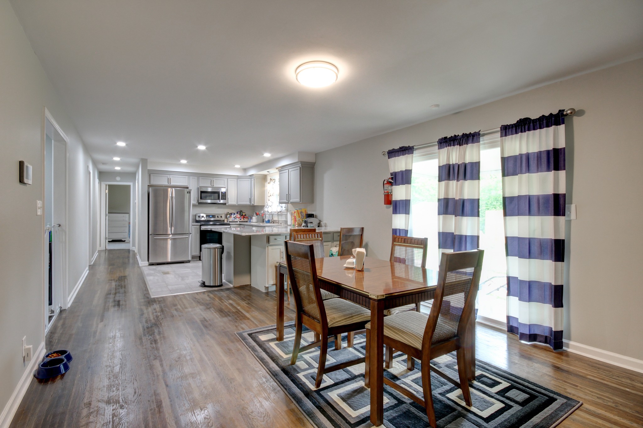 309 Burch Road Clarksville, TN 37042 - Photo 2 of 12 a view of a dining room with furniture and a kitchen