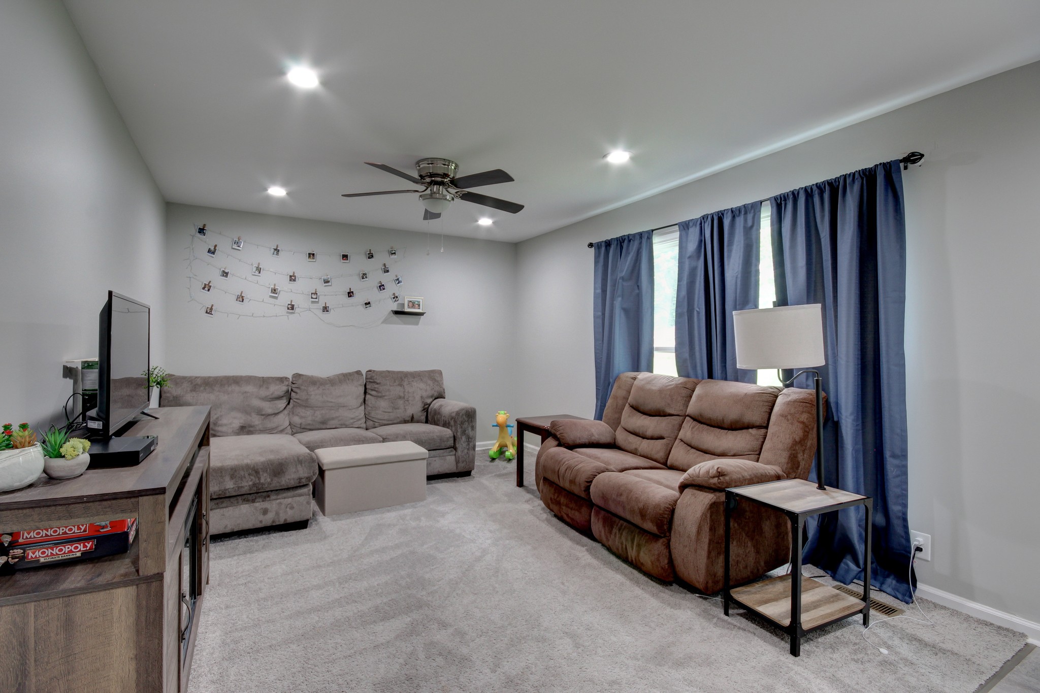 309 Burch Road Clarksville, TN 37042 - Photo 6 of 12 a living room with furniture and a flat screen tv