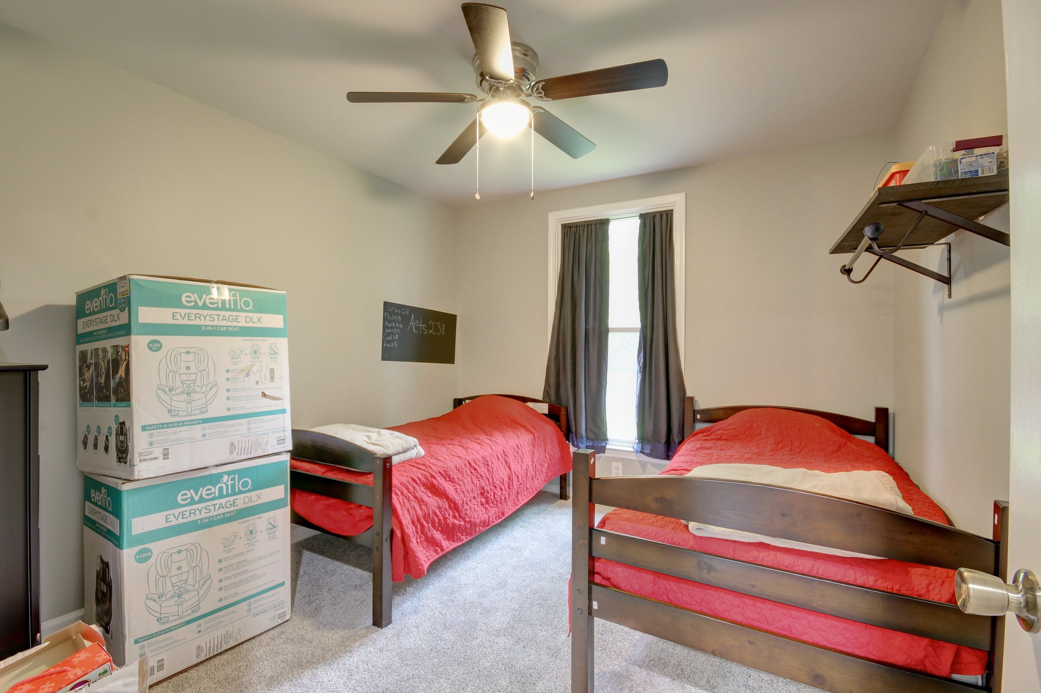 309 Burch Road Clarksville, TN 37042 - Photo 9 of 12 a bedroom with a bed and window
