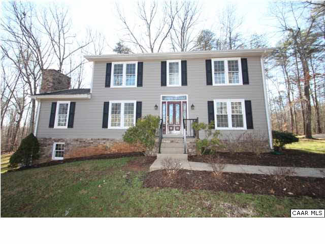 1353 Durrett Ridge Road Earlysville, VA 22936 - Photo 1 of 21 a house view with a garden space