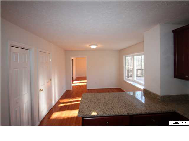 1353 Durrett Ridge Road Earlysville, VA 22936 - Photo 8 of 21 a room with window and a flat screen tv