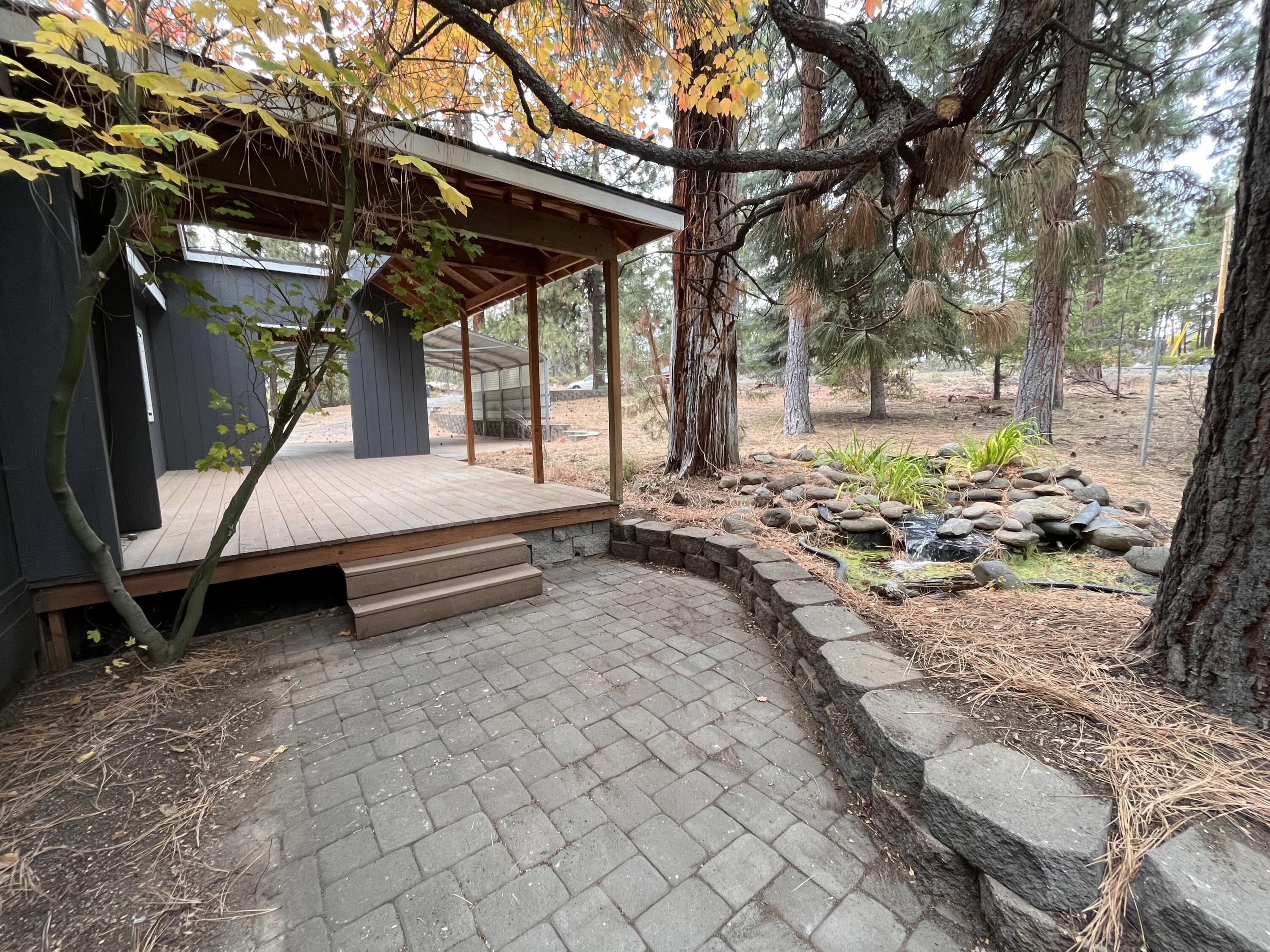 60184 Crater Road Bend, OR 97702 - Photo 27 of 29 Paver patio and water feature.