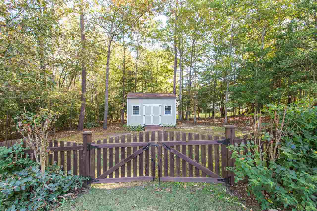 12 Vista Ridge Drive Willow Spring, NC 27592 - Photo 28 of 30 A storage shed is provided for your convenience. Back Yard