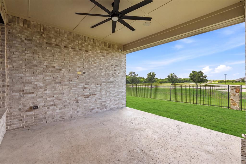 1313 Kirkwood Road Rockwall, TX 75087 - Photo 6 of 39 Large covered patio with green views and no houses behind!