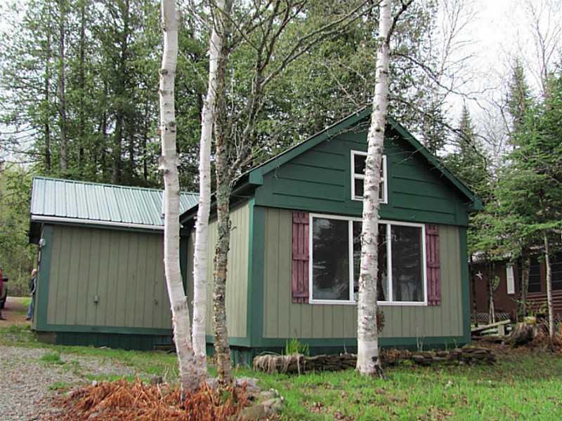 156 W Road Portage, ME 04768 - Photo 2 of 13 Exterior Front.
