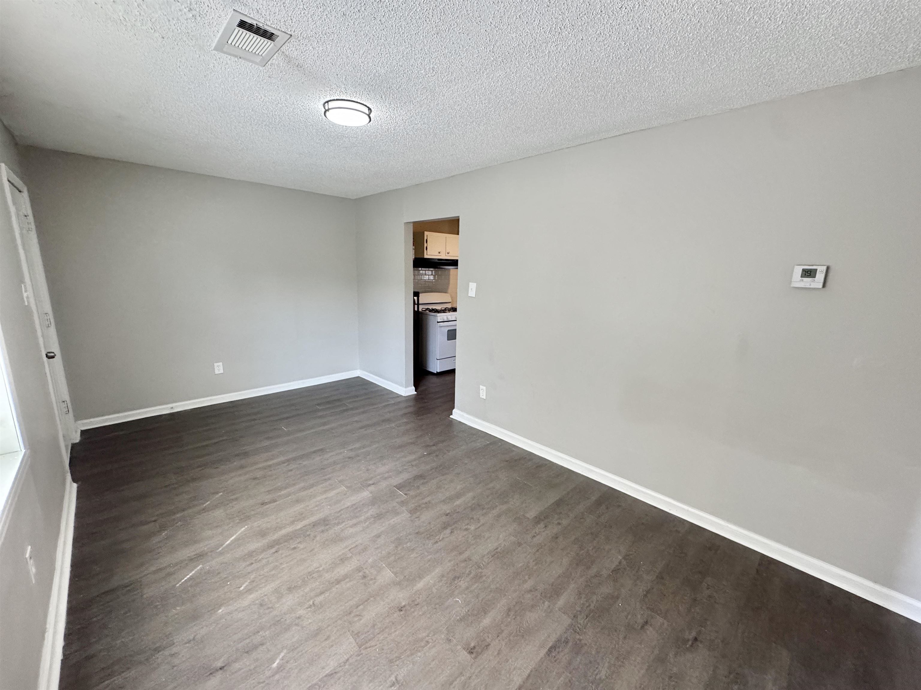 1825 Castalia Street Memphis, TN 38114 - Photo 22 of 30 wooden floor in an empty room