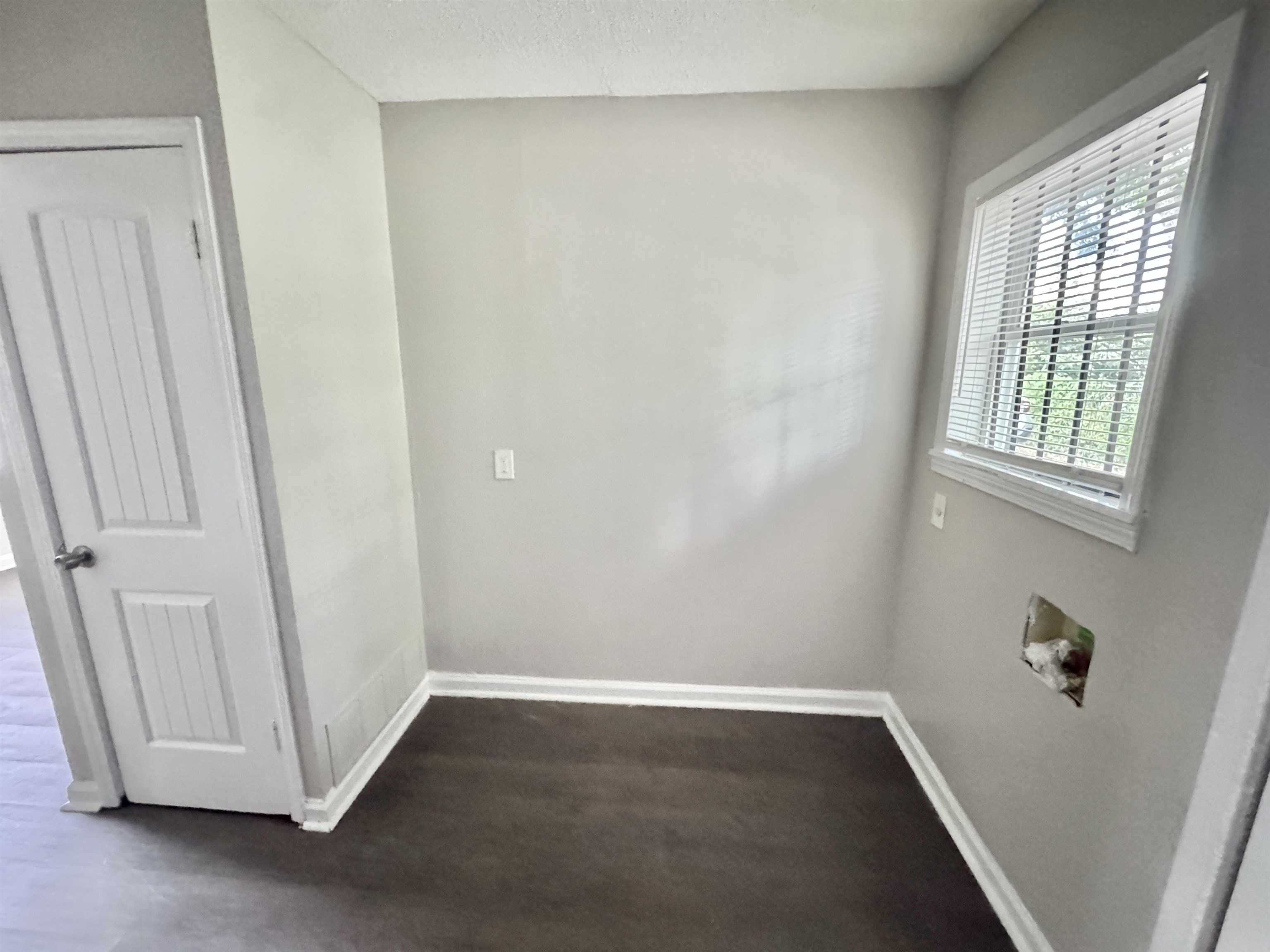1825 Castalia Street Memphis, TN 38114 - Photo 8 of 30 a view of an empty room with a window