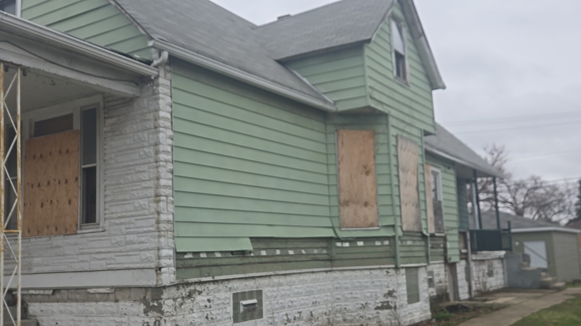 738 West 103rd Street Chicago, IL 60628 - Photo 3 of 20 a view of a house with a door