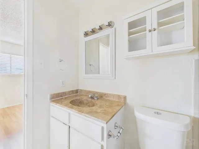 a utility room with a sink dryer and washer