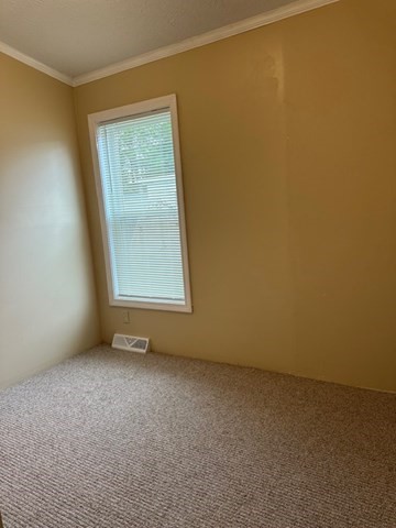 189 Springfield Road, Unit 24 Westfield, MA 01085 - Photo 13 of 22 an empty room with a window