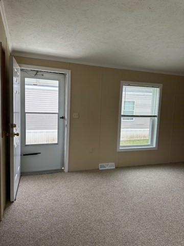 189 Springfield Road, Unit 24 Westfield, MA 01085 - Photo 4 of 22 an empty room with a window