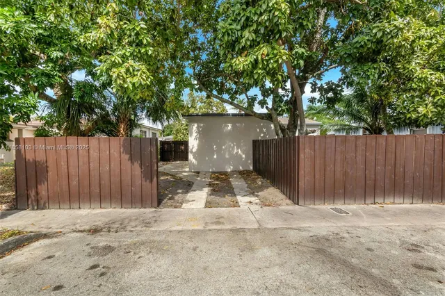 a view of a backyard with a garden