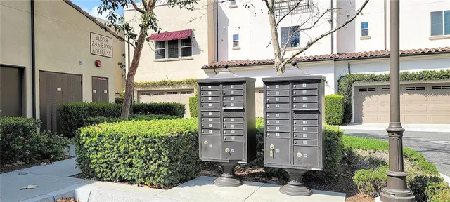 a view of a patio with a table and chairs under an umbrella with wooden floor