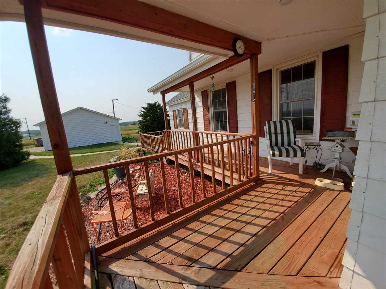 9700 West Edgewood Road Dixon, IL 61021 - Photo 30 of 36 a view of balcony with wooden floor and outdoor seating