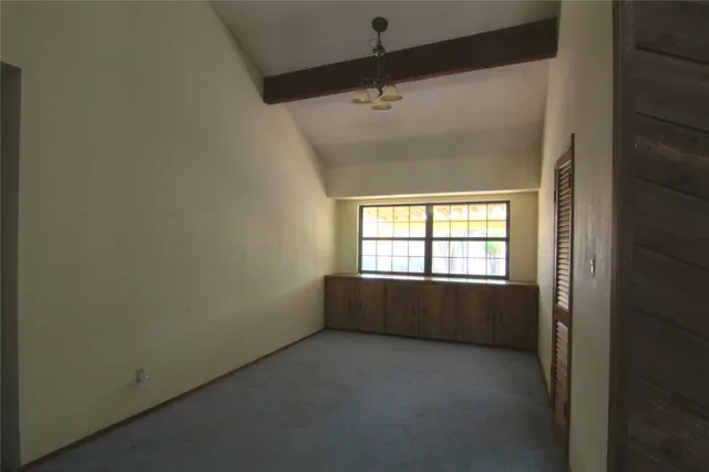 an empty room with a window