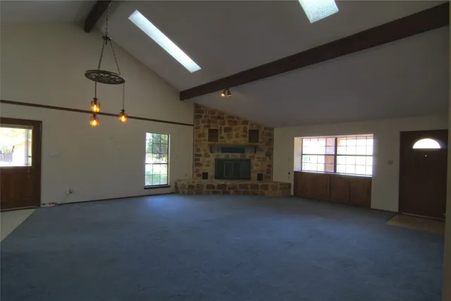 an empty room with windows