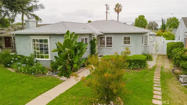 a view of a house with a garden