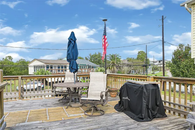 a view of a balcony with chairs