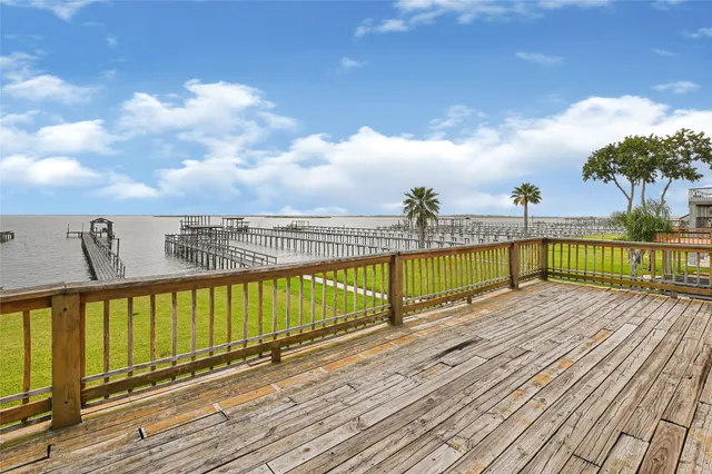 a view of wooden floor with a lake view