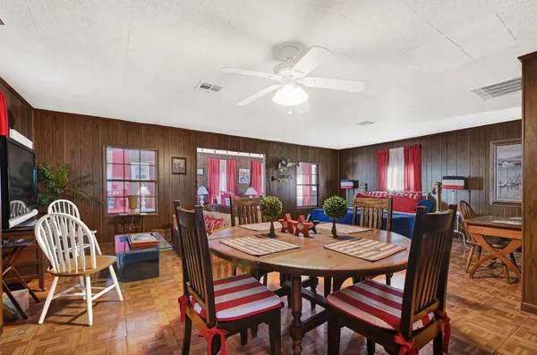 a view of a dining room with furniture