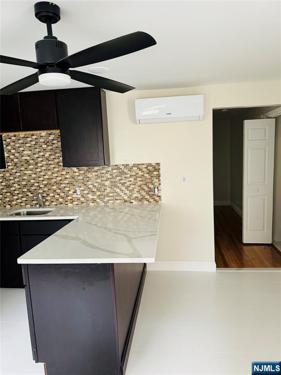 14 Elm Street Paterson, NJ 07501 - Photo 2 of 11 a bathroom with a sink and a mirror