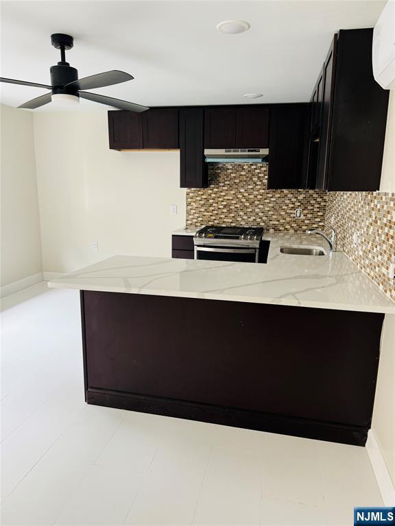 14 Elm Street Paterson, NJ 07501 - Photo 3 of 11 a living room with furniture