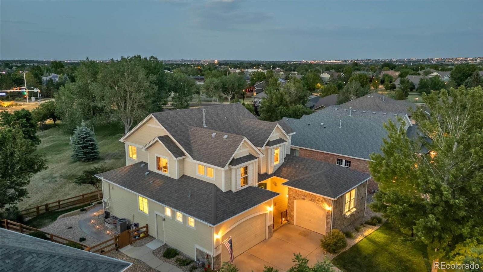 4786 Rabbit Mountain Road Broomfield, CO 80020 - Photo 1 of 41 an aerial view of a house with a garden