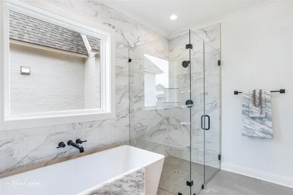 walk in closet with white walls