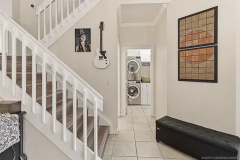 a view of entryway with stairs and furniture