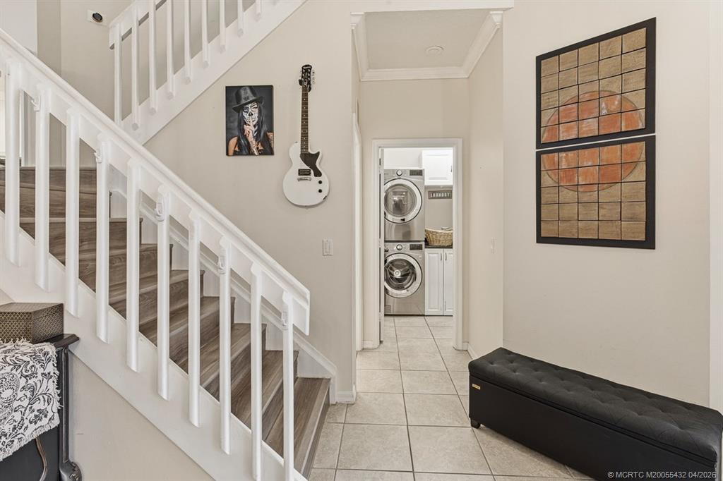 7213 Southeast Magellan Lane Stuart, FL 34997 - Photo 24 of 47 a view of entryway with stairs and furniture