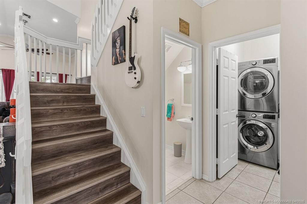 7213 Southeast Magellan Lane Stuart, FL 34997 - Photo 26 of 47 a view of a hallway with washer and dryer