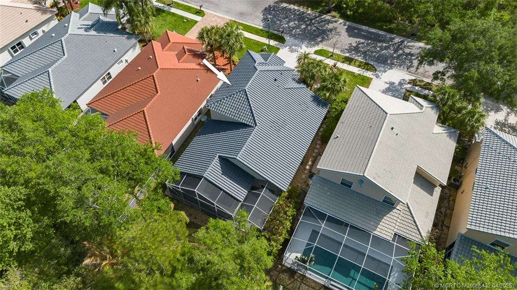 7213 Southeast Magellan Lane Stuart, FL 34997 - Photo 40 of 47 an aerial view of a house with a yard