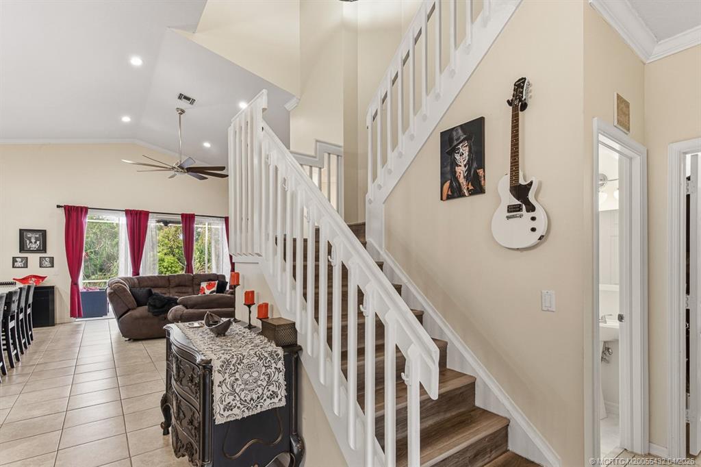 7213 Southeast Magellan Lane Stuart, FL 34997 - Photo 5 of 47 a view of entryway livingroom and hall