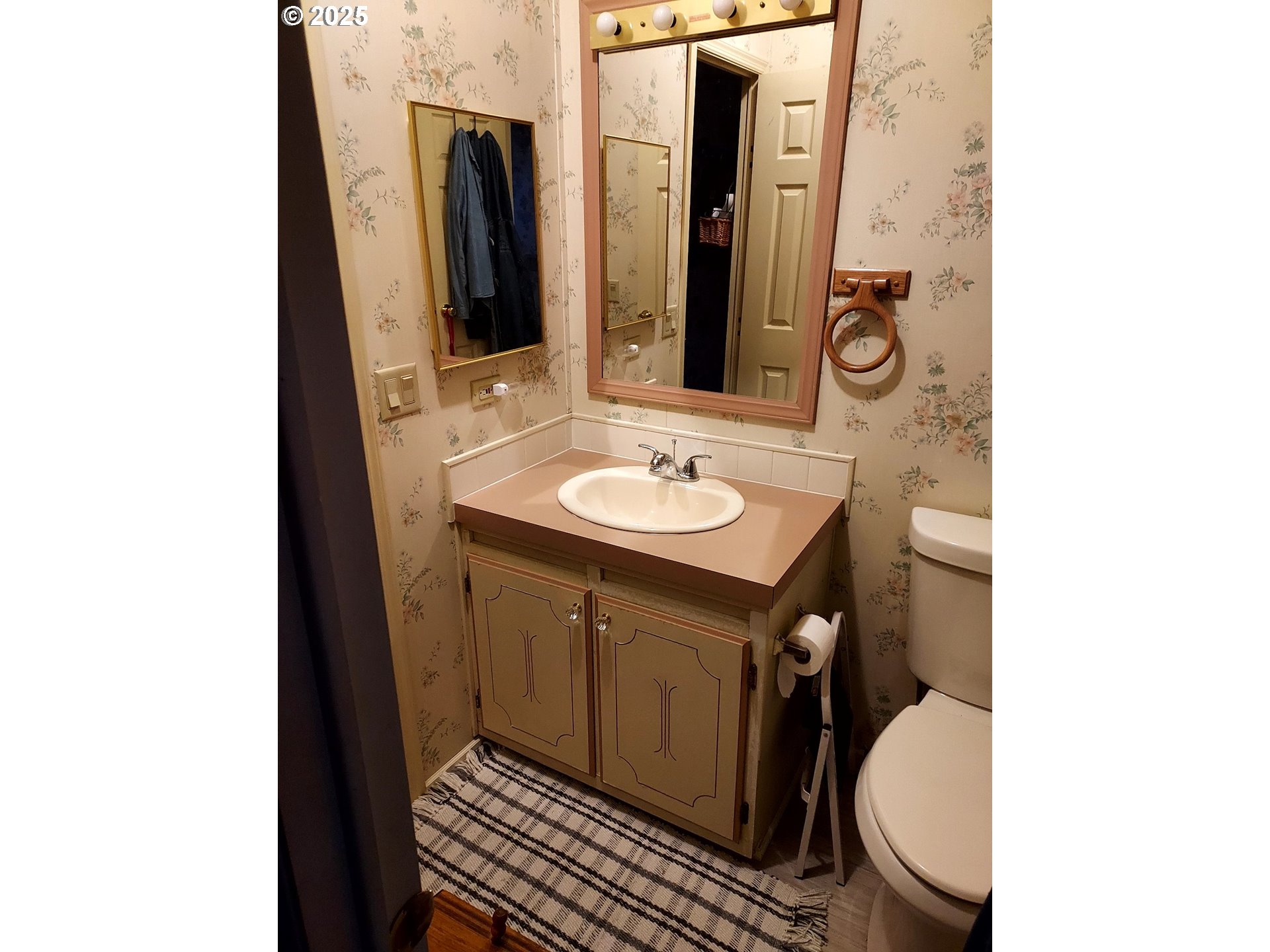 1475 Green Acres Road, Unit 83 Eugene, OR 97408 - Photo 15 of 19 a bathroom with a sink and a mirror