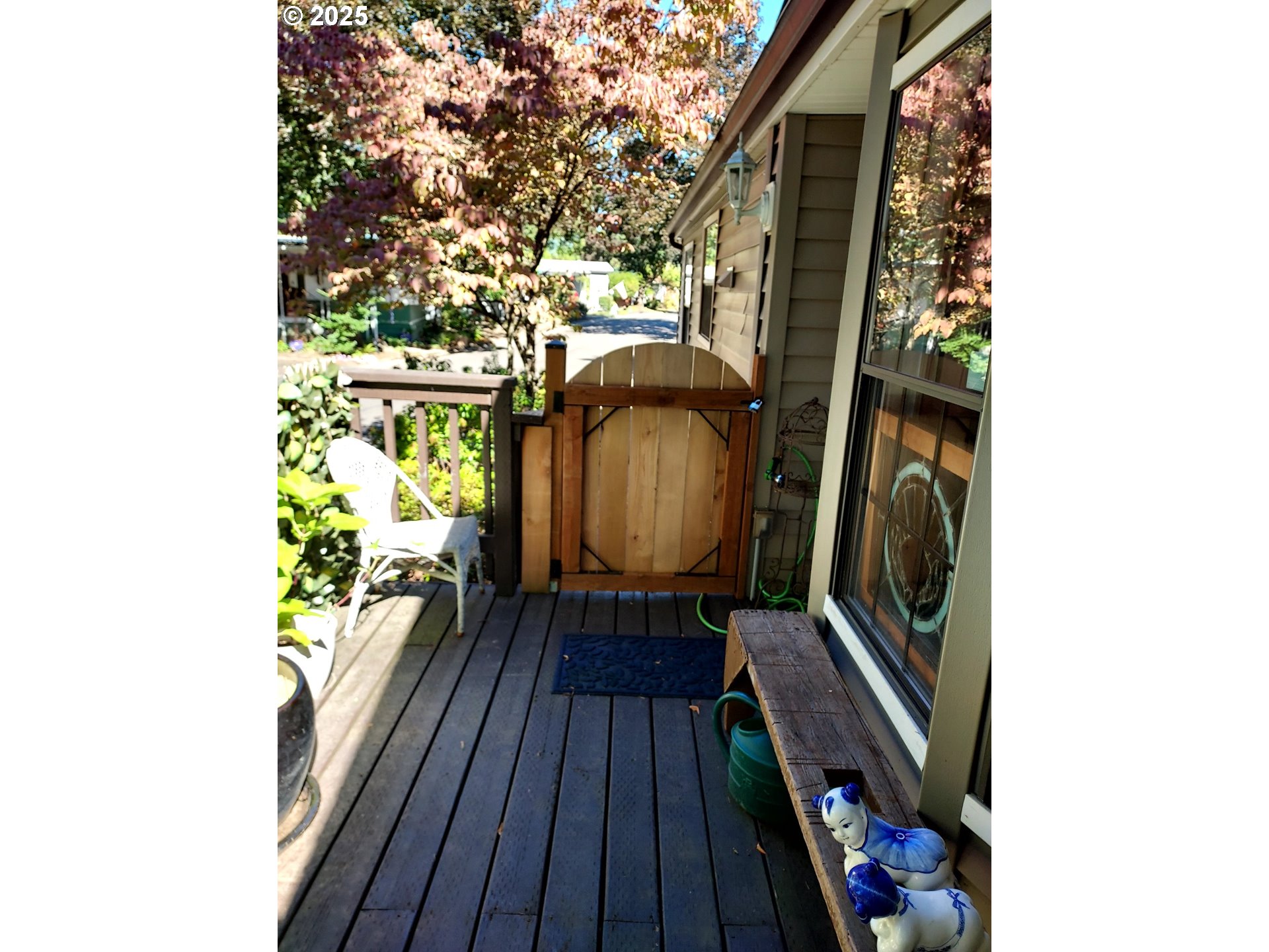 1475 Green Acres Road, Unit 83 Eugene, OR 97408 - Photo 4 of 19 a view of balcony with wooden floor