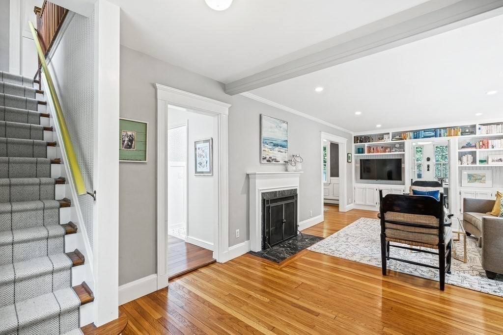229 Weston Road Wellesley, MA 02482 - Photo 12 of 24 a living room with furniture and a fireplace